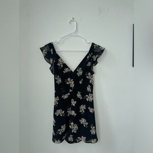 Reversible black floral romper